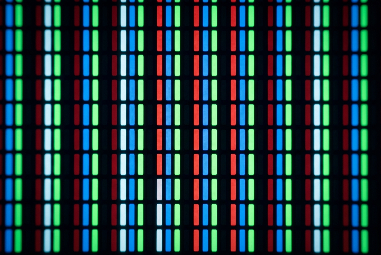 Close-up view of OLED subpixel structure showing RWBG layout
